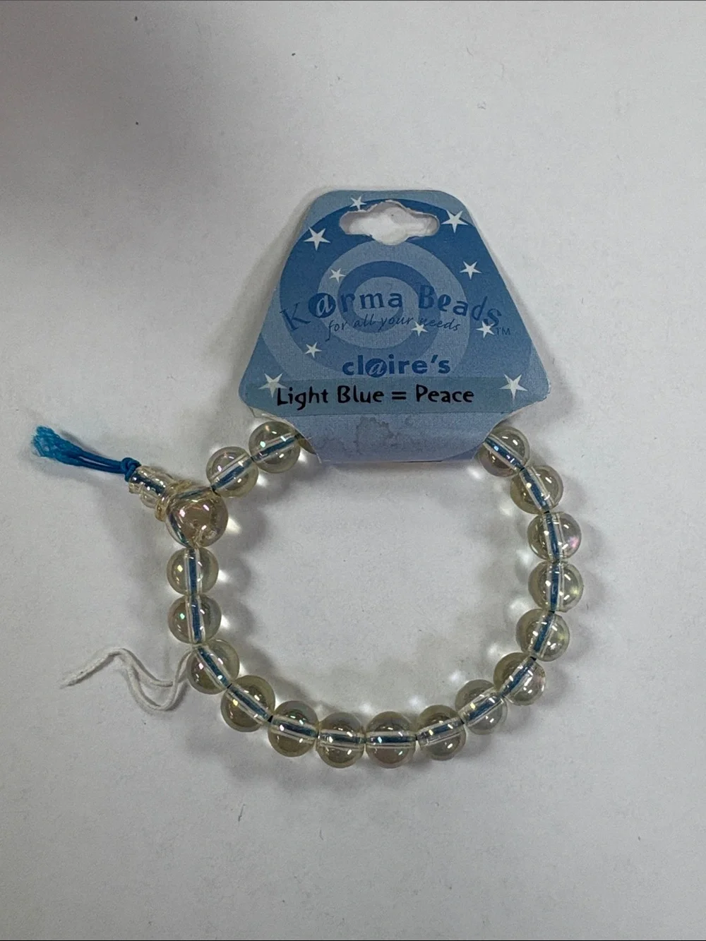 Claire's Light Blue Cord Iridescent Karma Bead Stretch Bracelet
